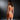 Flirty Mini Skirt. Waist Band. Reversible Keyhole Feature in Front or Back. In Stretch Satiné Fabric. 570